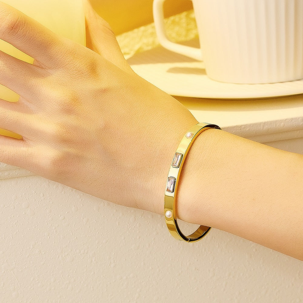 Stainless steel gold bangle with rhinestones