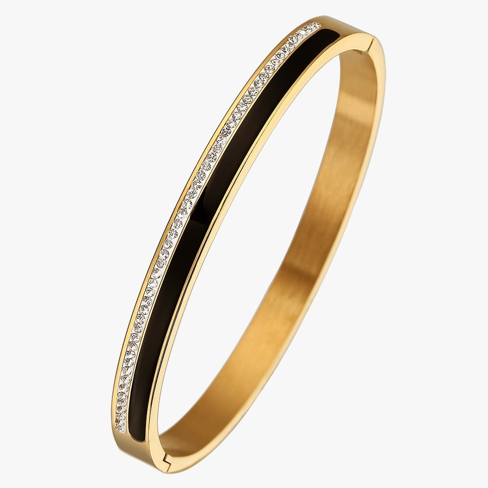 Bangle with zircon stones and black color design on top