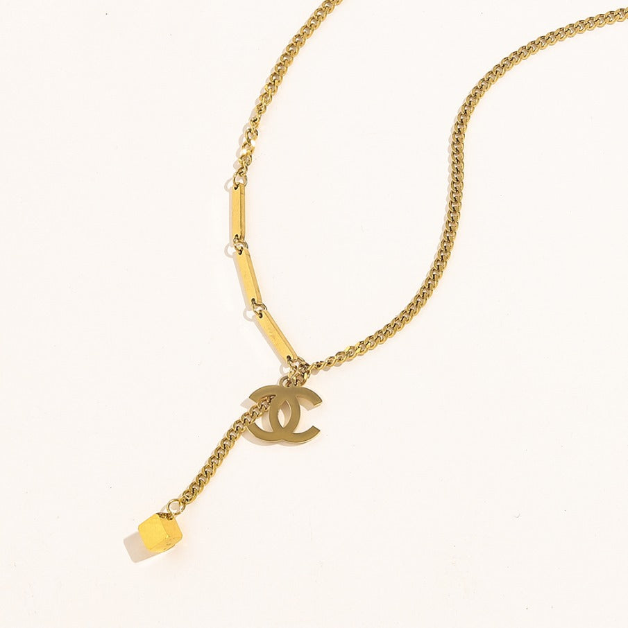N-Chanel35. Chanel Necklace with chanel embossed pendant.