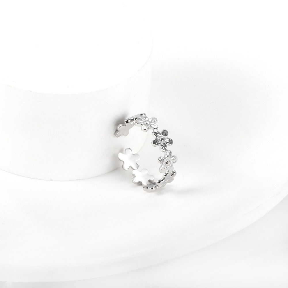 Ring with flower designs all over