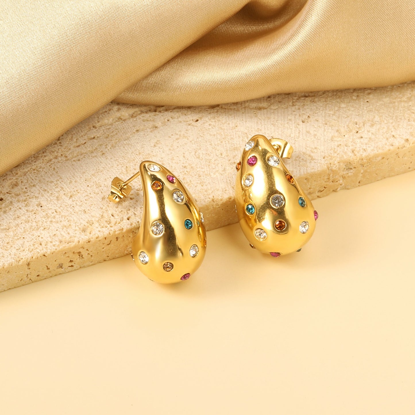 Tear drops earring with different color stones.