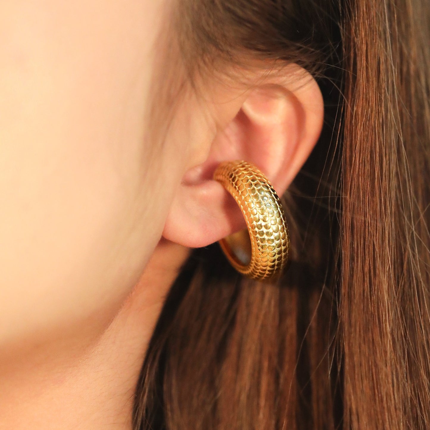Cuff with designs all over