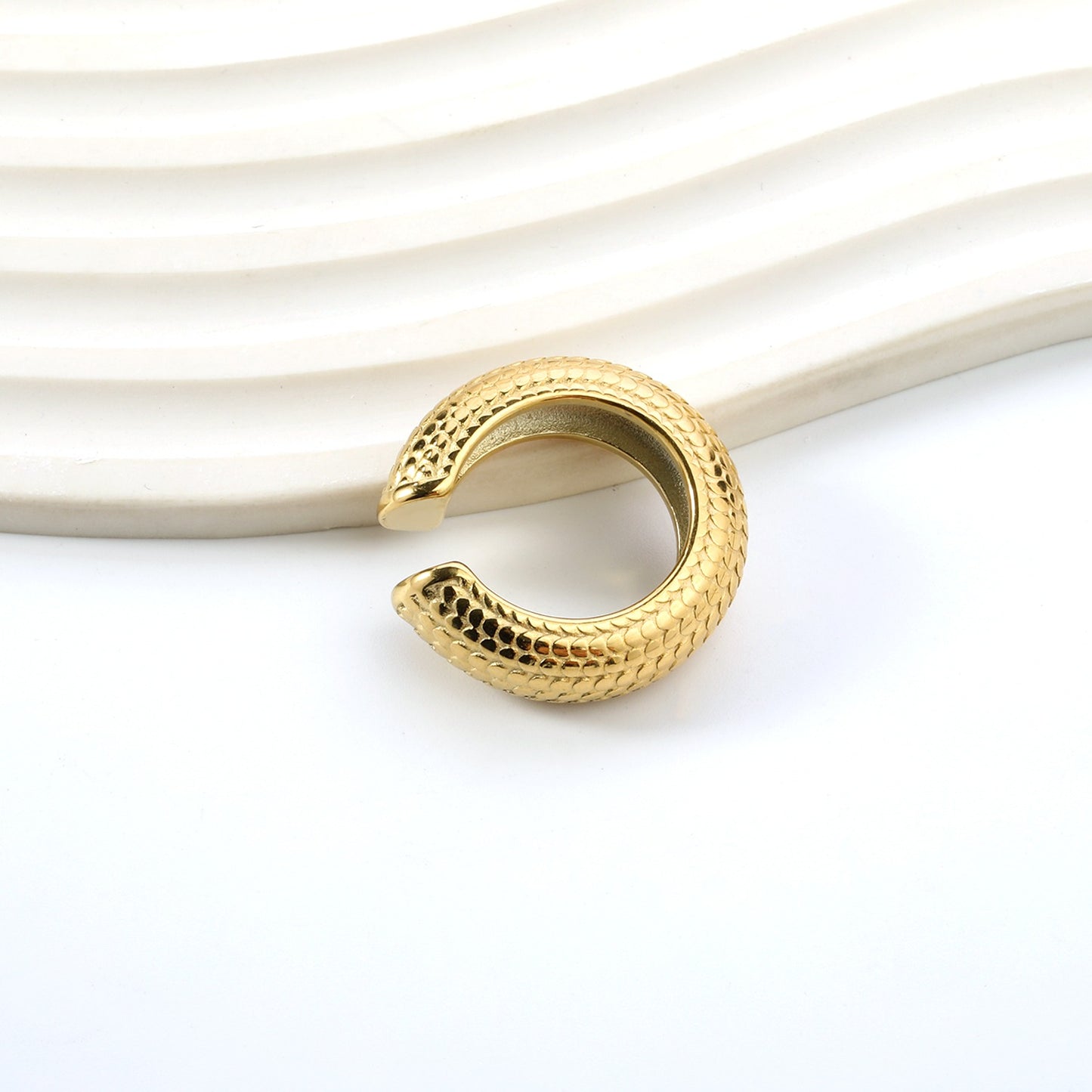 Cuff with designs all over
