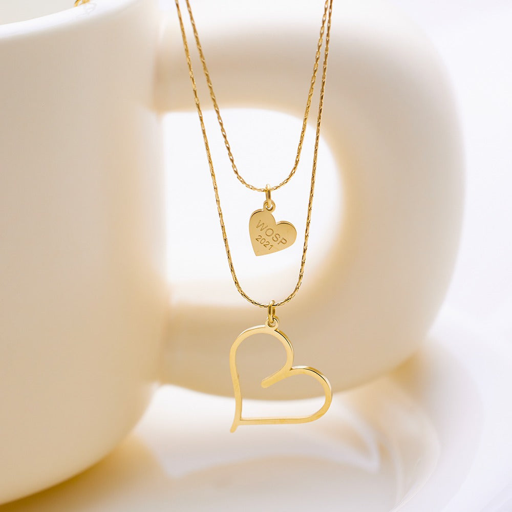 Double layered necklace withheart pendants on both chains