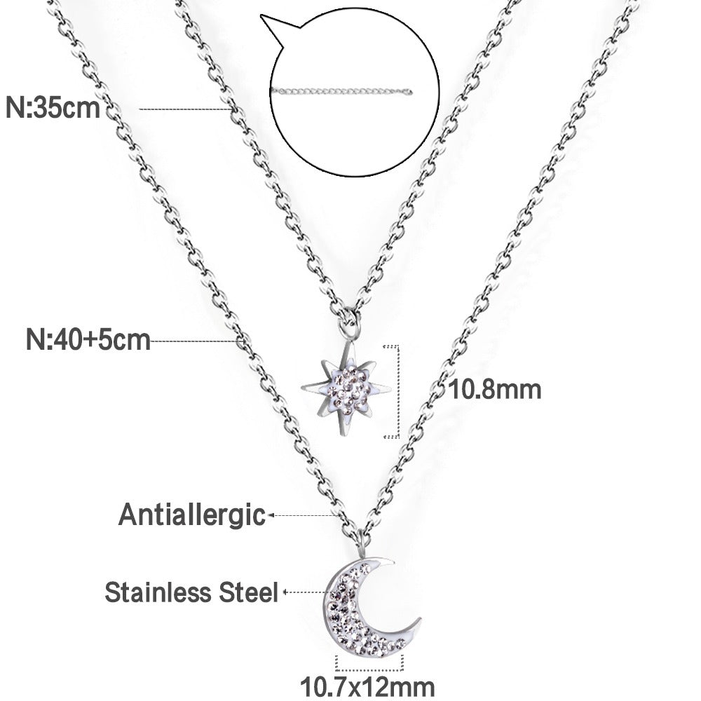 Double layered silver necklace with moon pendant in inner chain and star pendant in outer chain