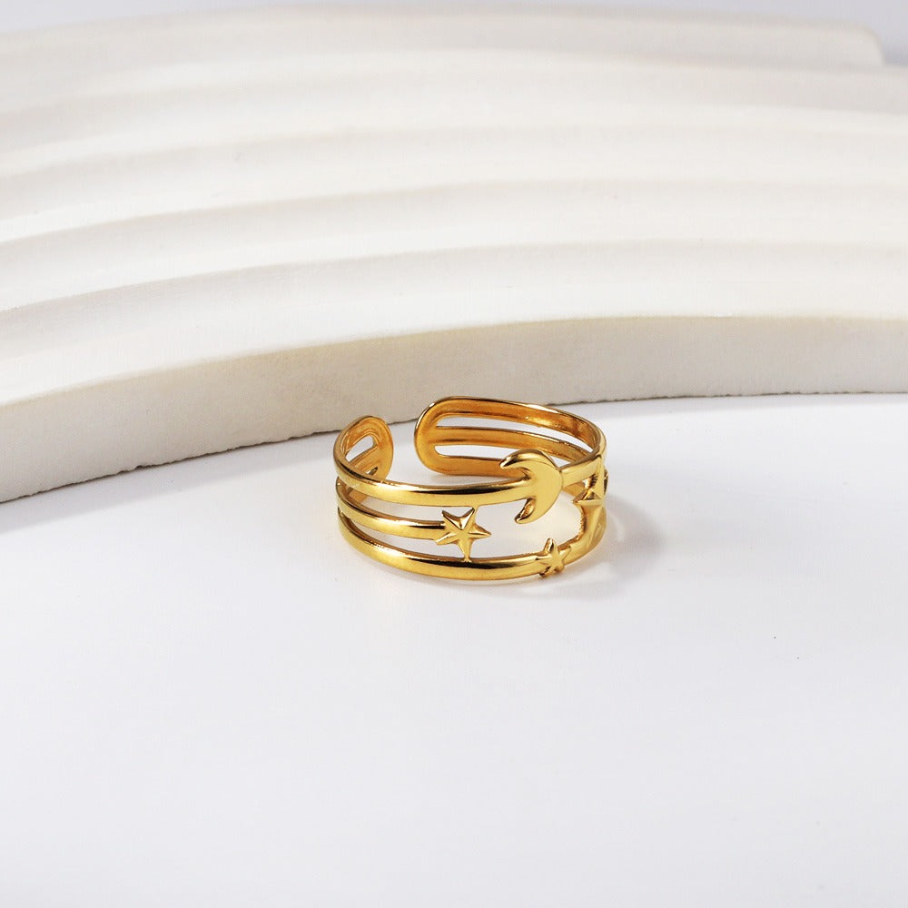 Ring with star and moon design