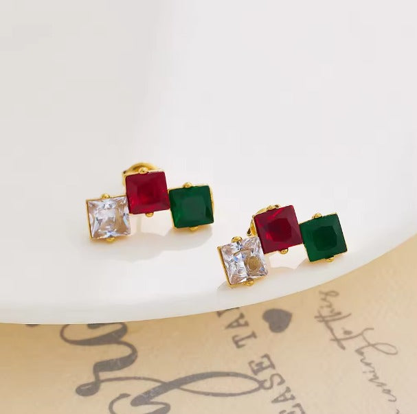 Stud with white, dark pink and dark green crystal gemstones. Fine Jewelry.