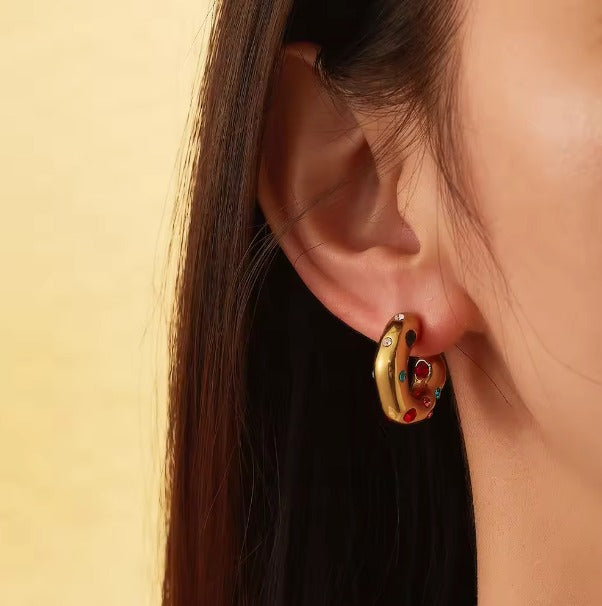 Half hoop earring with Different color stones.