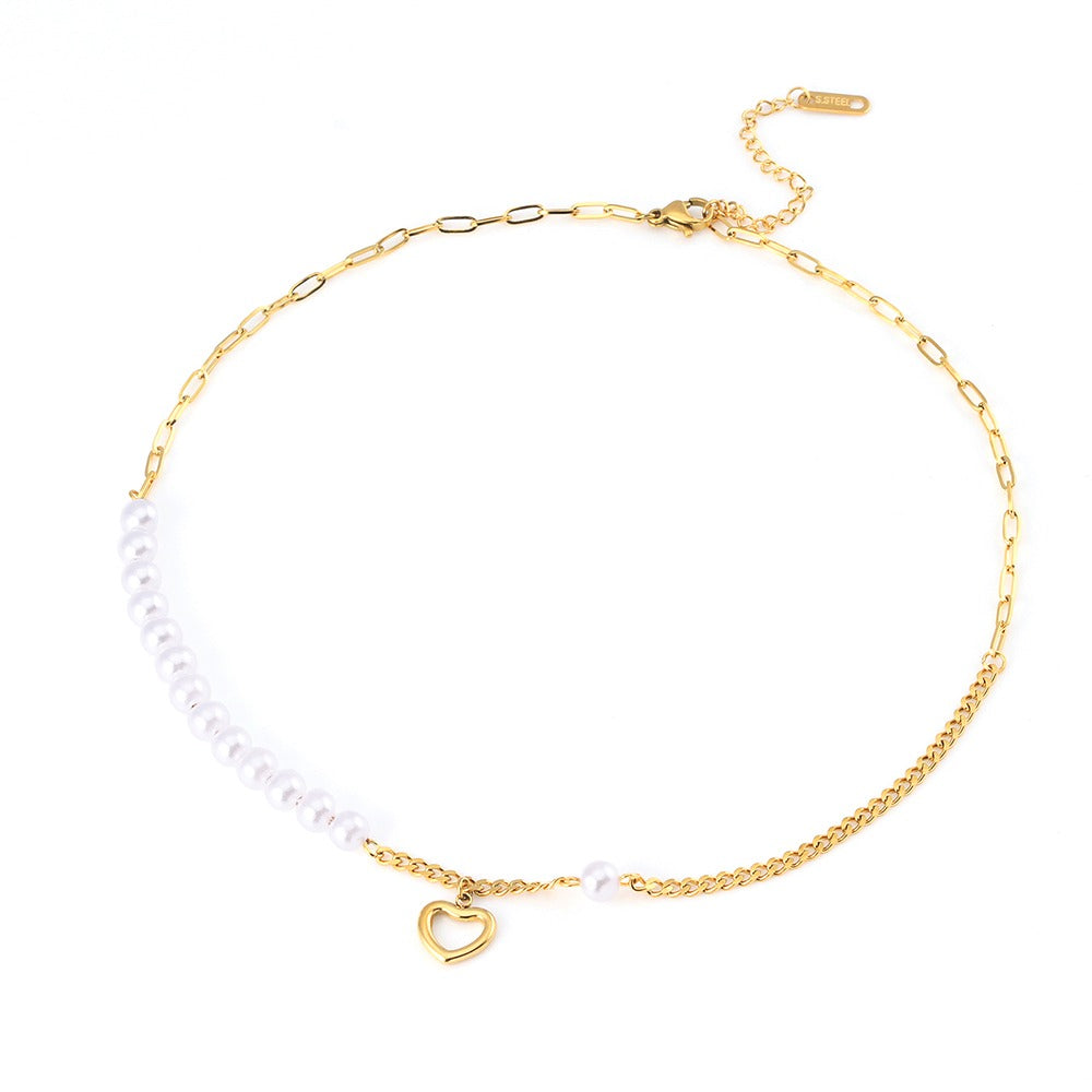Necklace with chain and pearls with a heart pendant