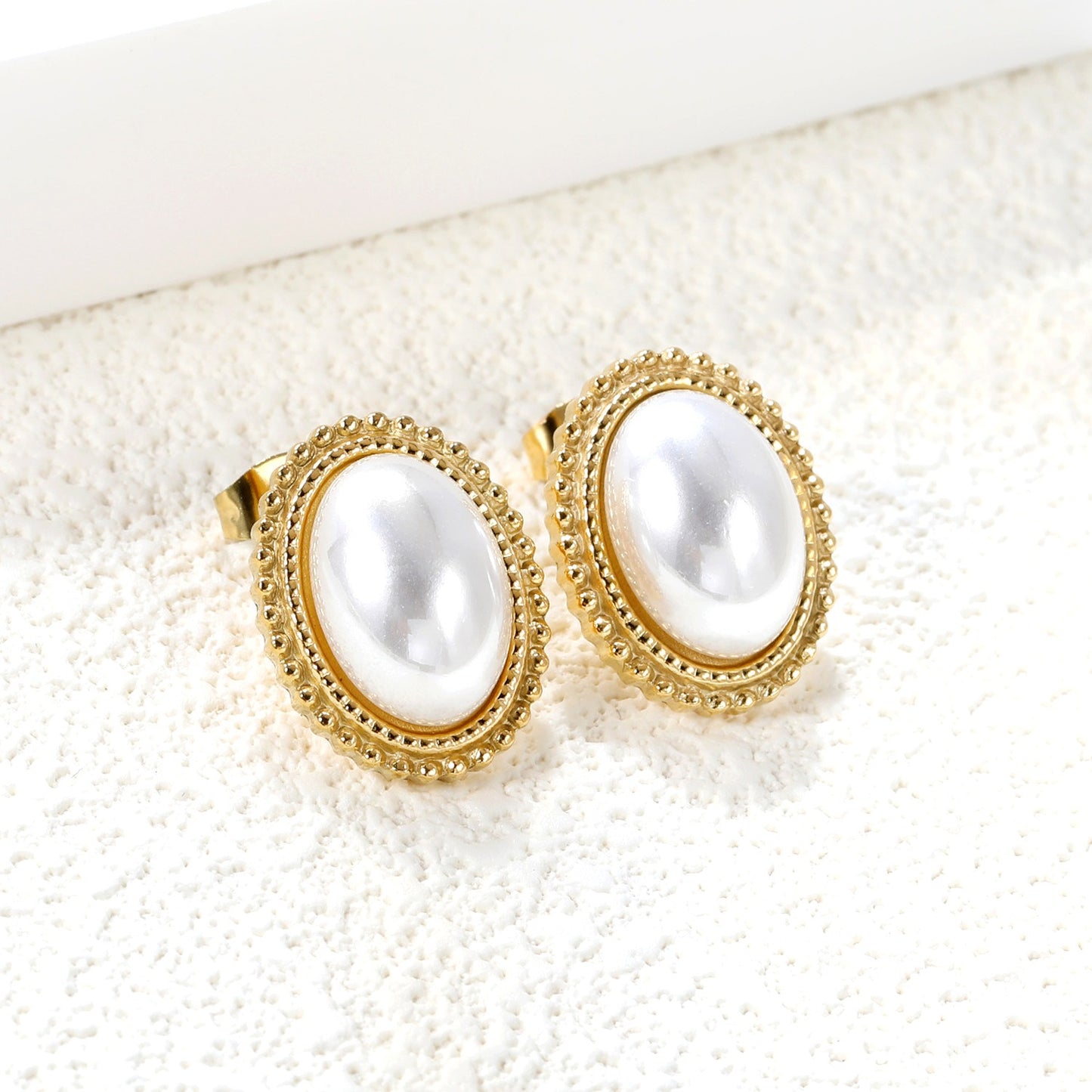 Oblong shaped pearl studs