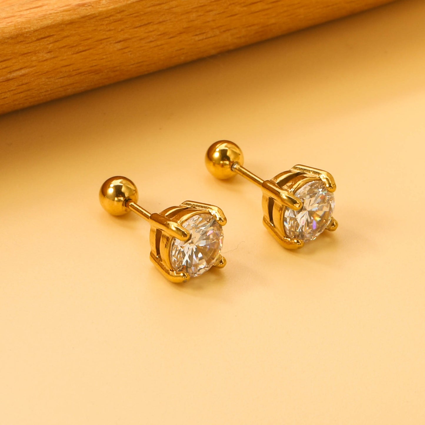 Screw studs with crystal stones on them