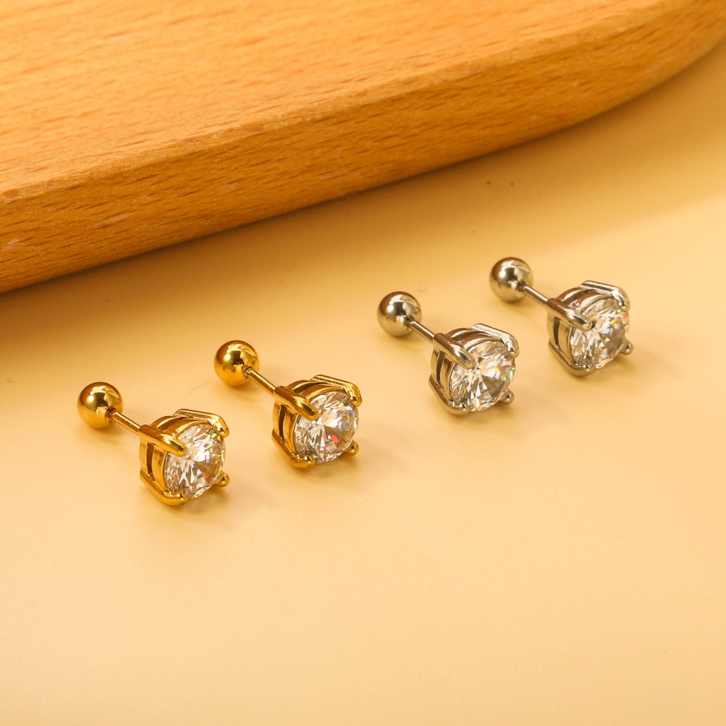 Screw studs with crystal stones on them
