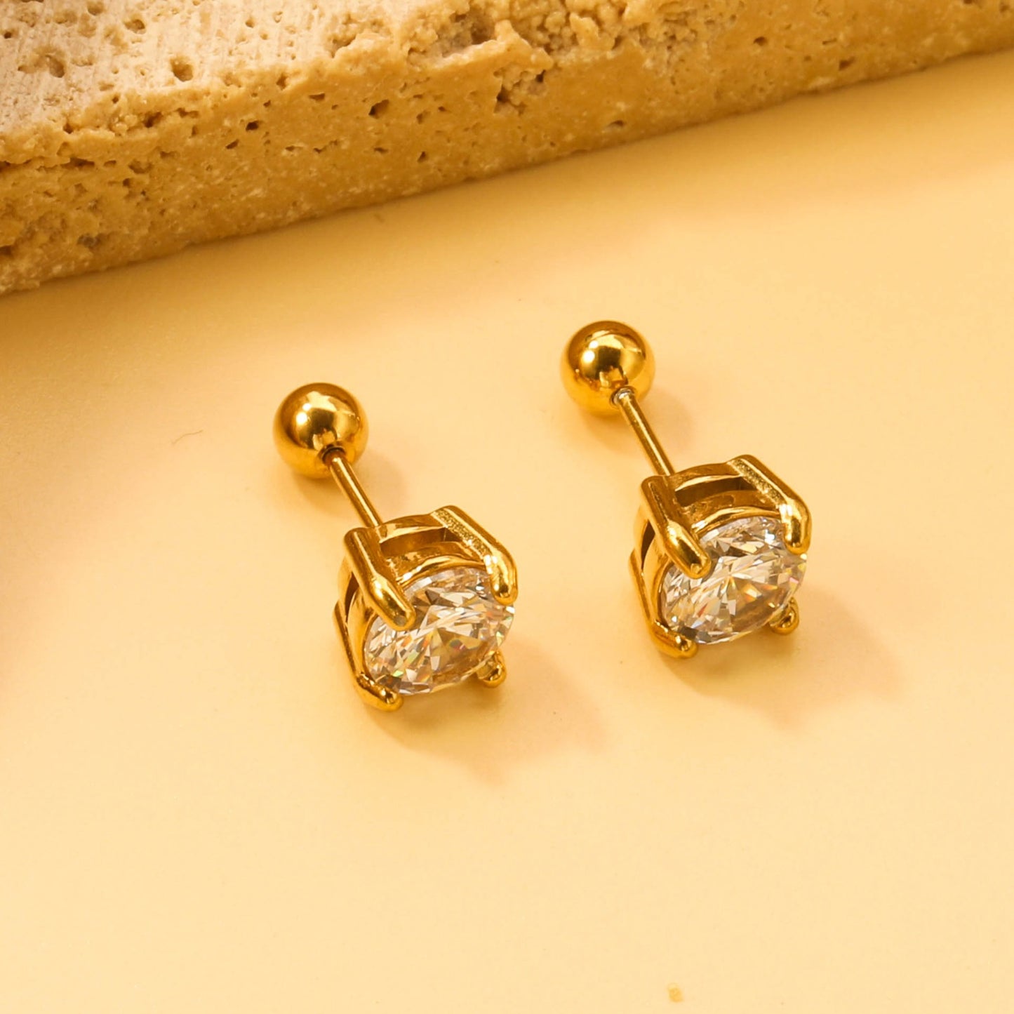 Screw studs with crystal stones on them