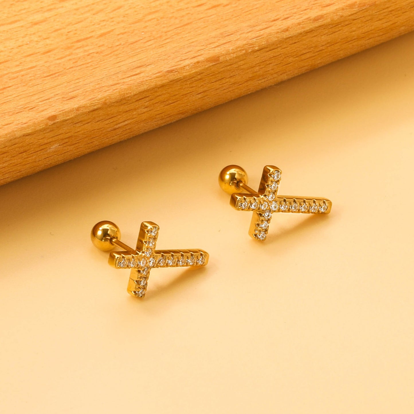 Cross screw studs with zircon stones