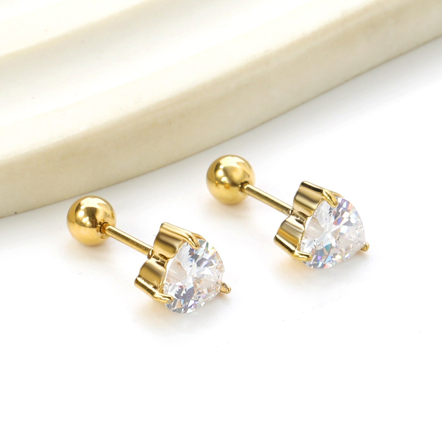Screw studs with crystal stones on them