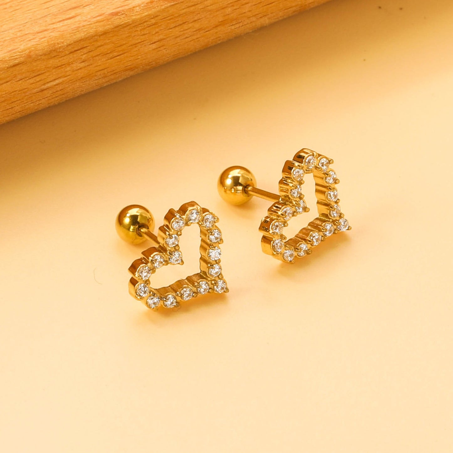 Heart shaped  screw studs with zircon stones.