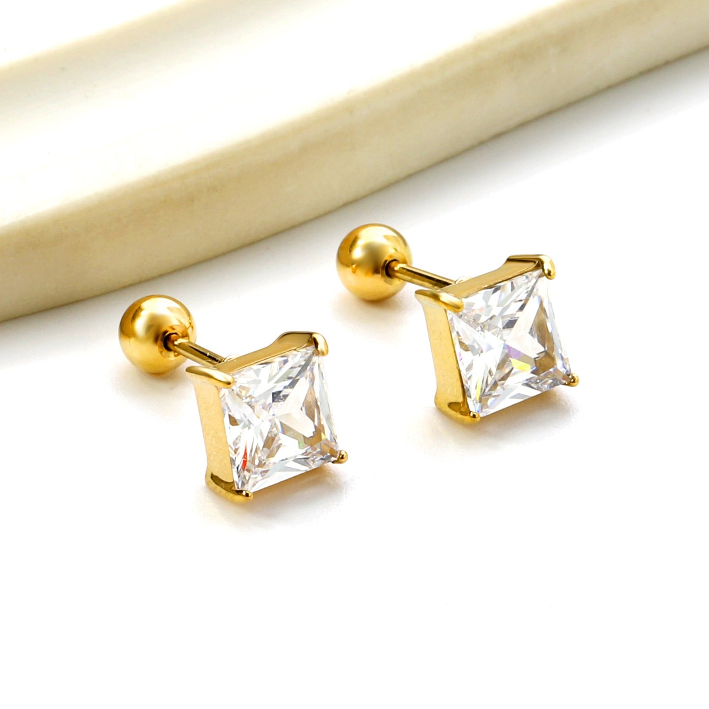 Screw studs with crystal stones on them