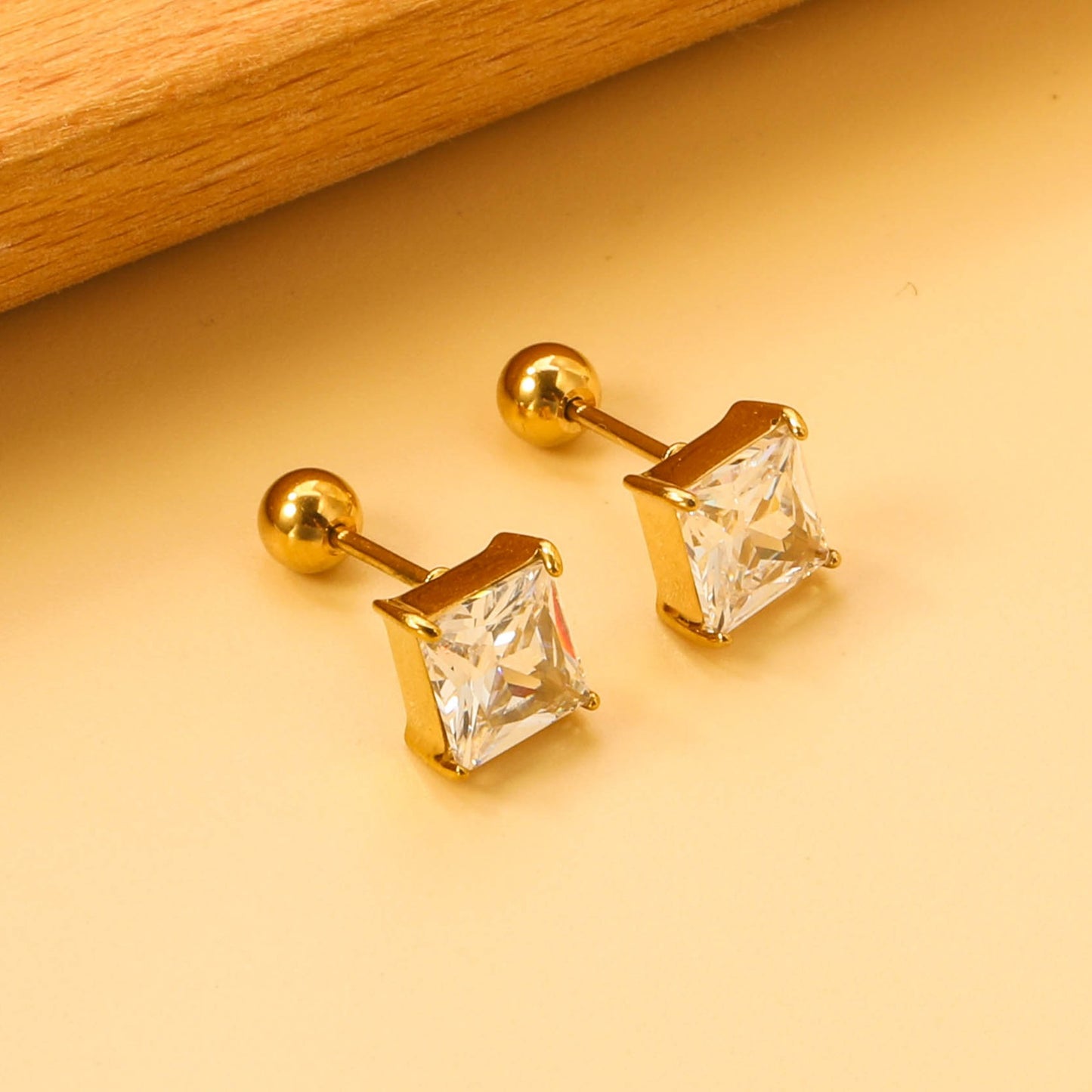 Screw studs with crystal stones on them