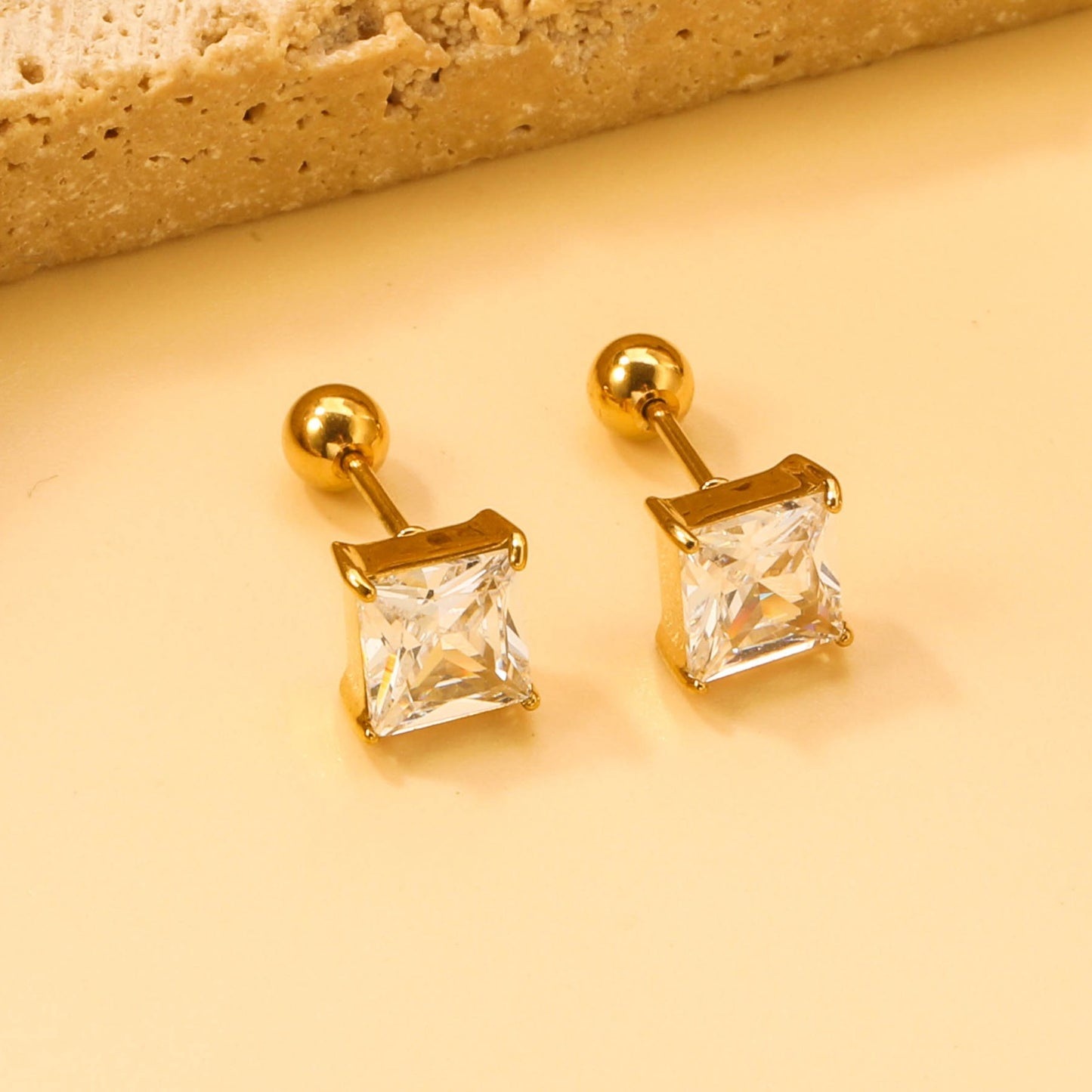 Screw studs with crystal stones on them