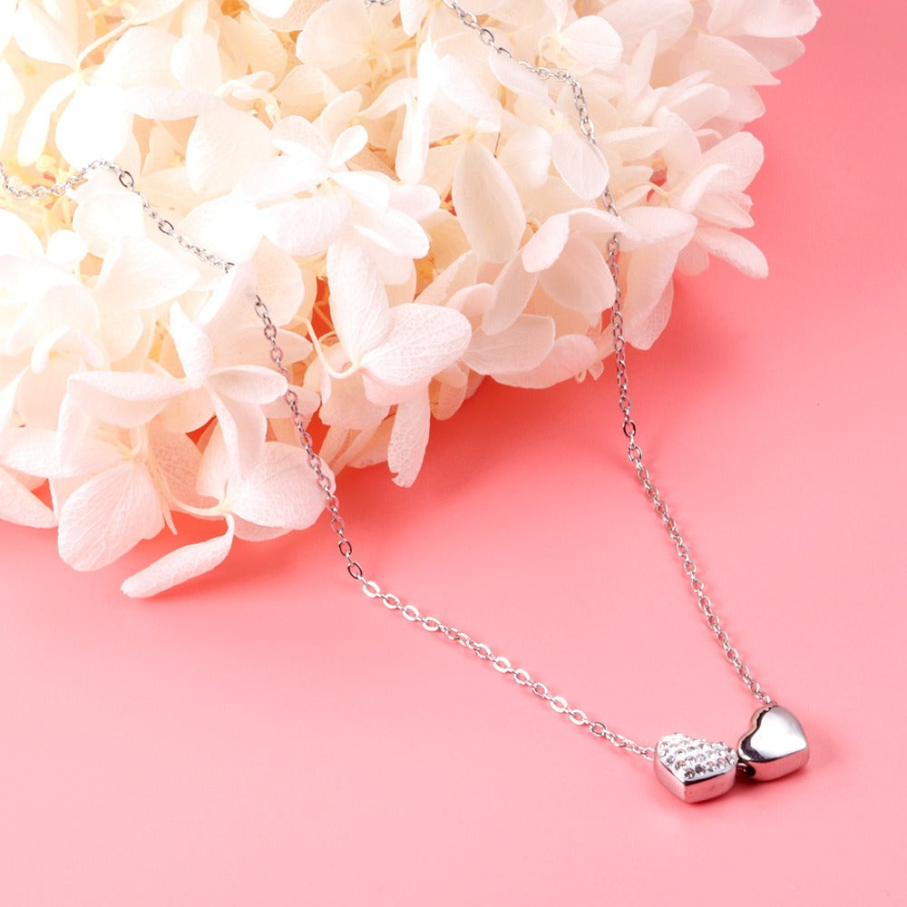 Silver necklace with two hearts pendant