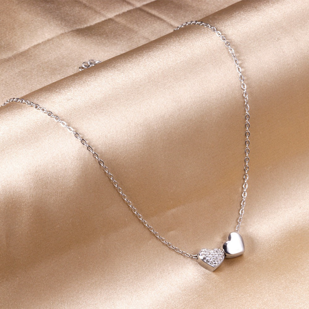 Silver necklace with two hearts pendant