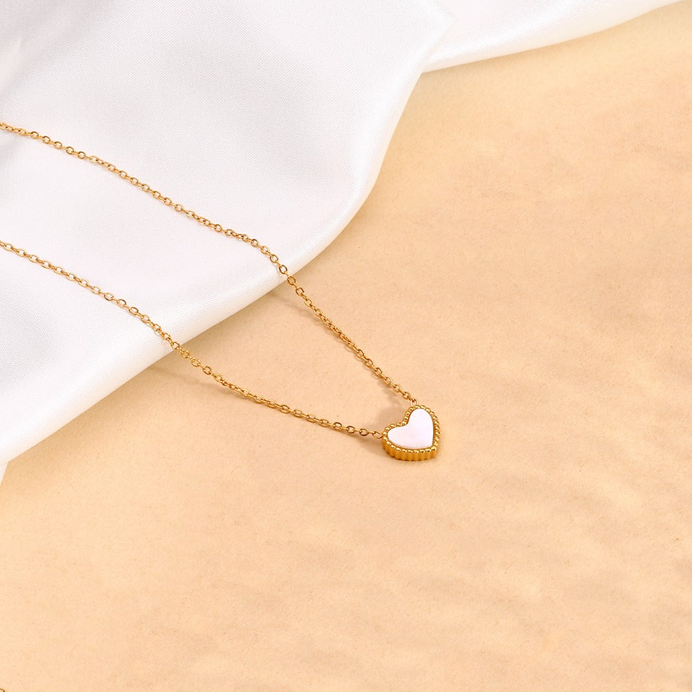 Necklace with heart shaped 2 in 1 colored pendant