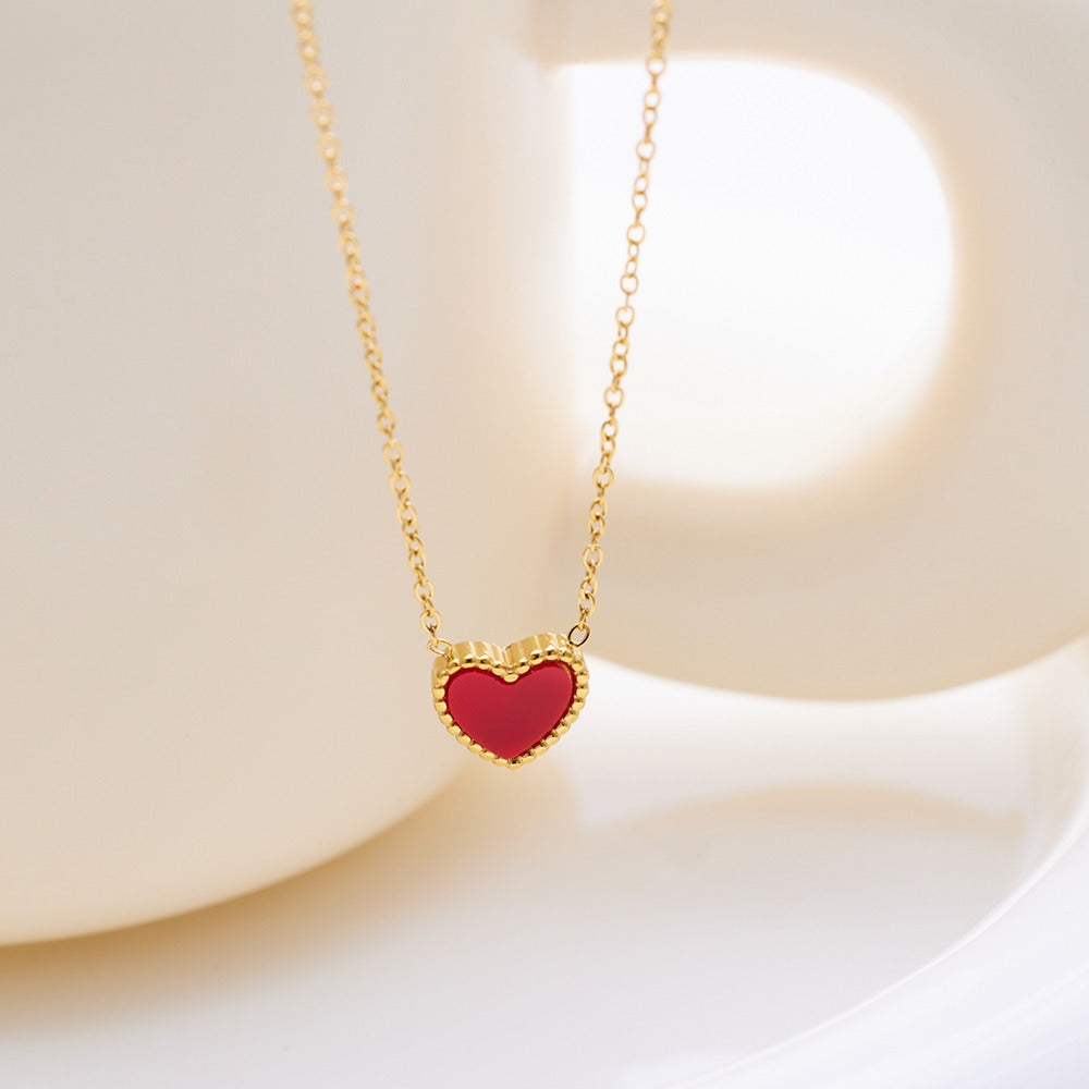 Necklace with heart shaped 2 in 1 colored pendant
