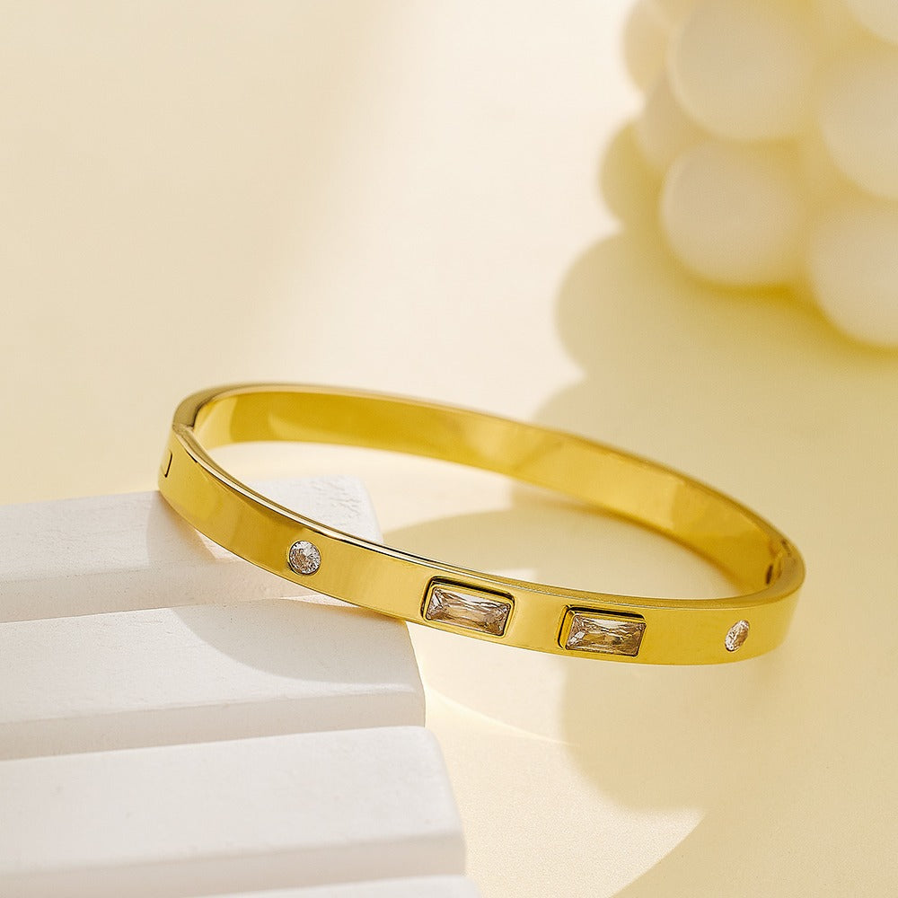 Stainless steel gold bangle with rhinestones