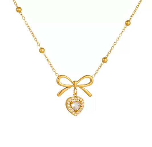 Heart and bowtie pendant necklace