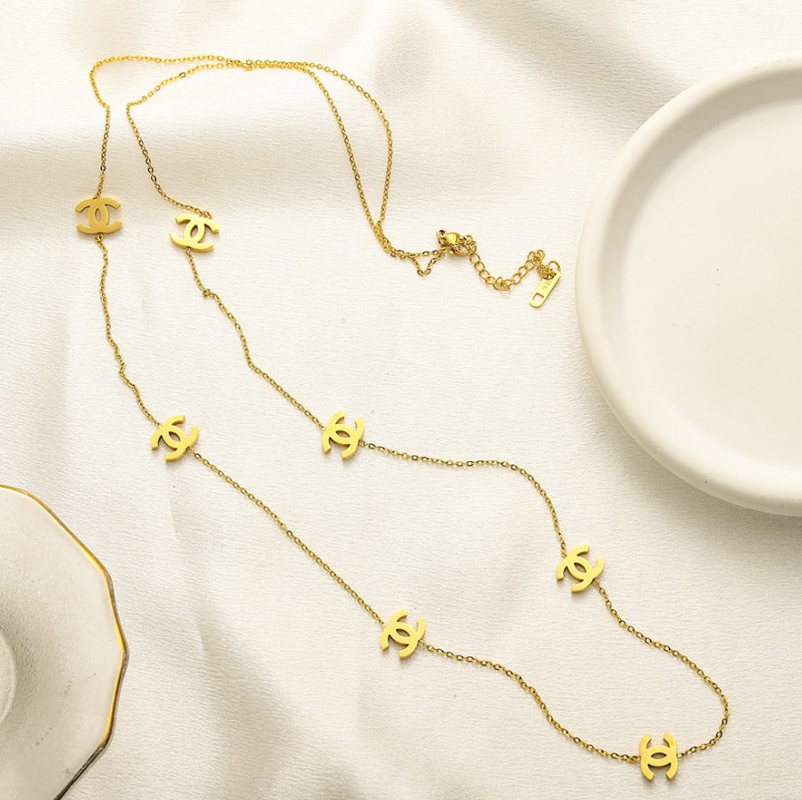 N-Chanel10. Long chanel Embossed necklace.