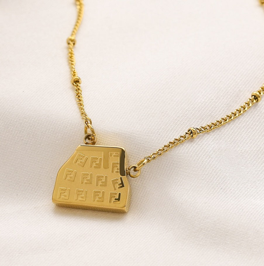 N-Fendi26. Fendi stainless steel waterproof Necklace with Bag design pendant.