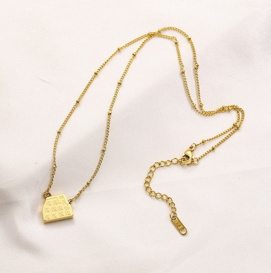 N-Fendi26. Fendi stainless steel waterproof Necklace with Bag design pendant.