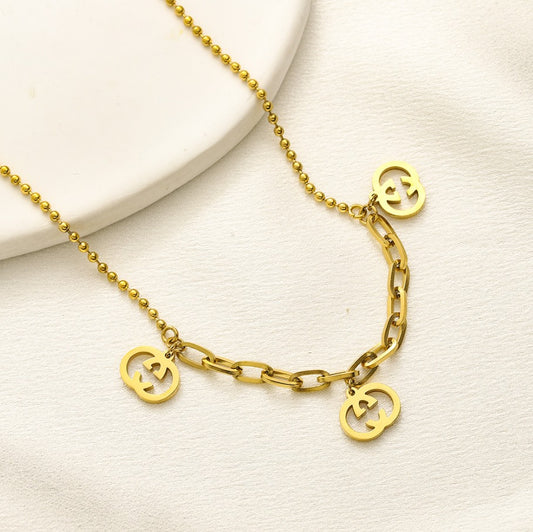 N-Gucci14. Gucci stainless steel necklace with charms.