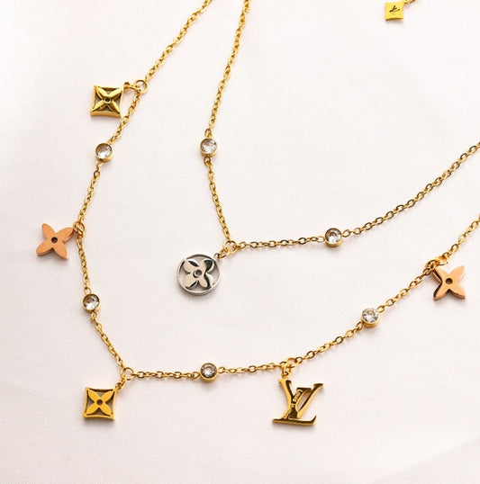N-LV77. LV Stainless steel, Waterproof, Double layered Necklace with pendant and zirconstones..
