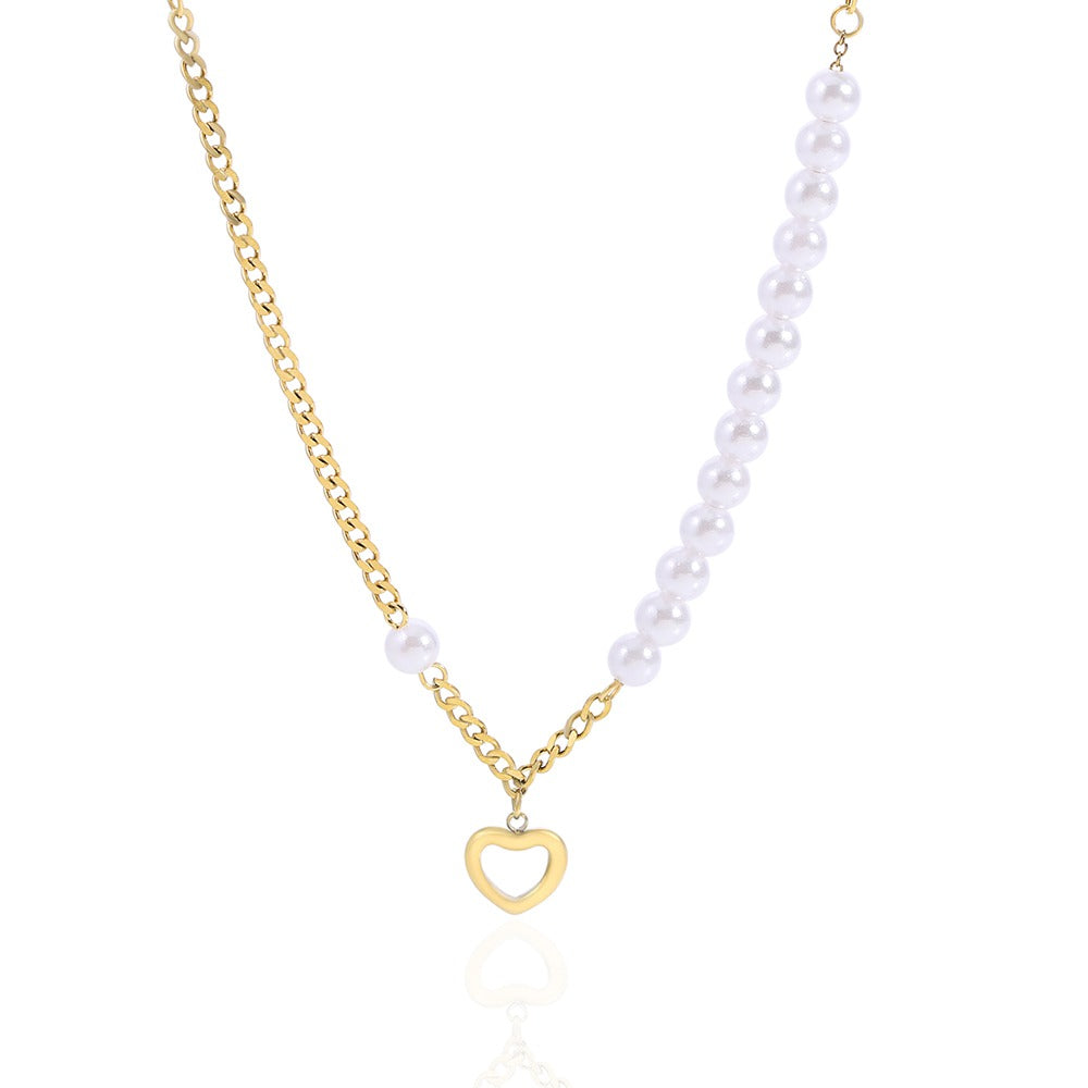 Necklace with chain and pearls with a heart pendant