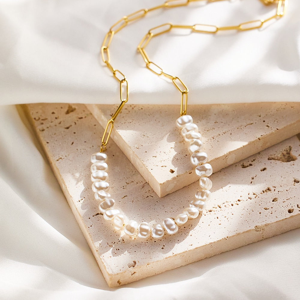 Necklace with chain and pearls, no pendant.