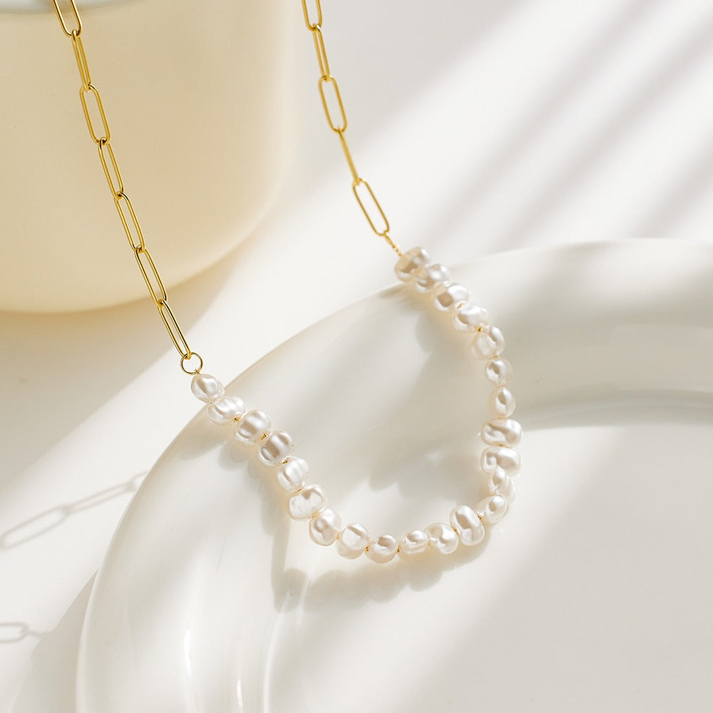 Necklace with chain and pearls, no pendant.