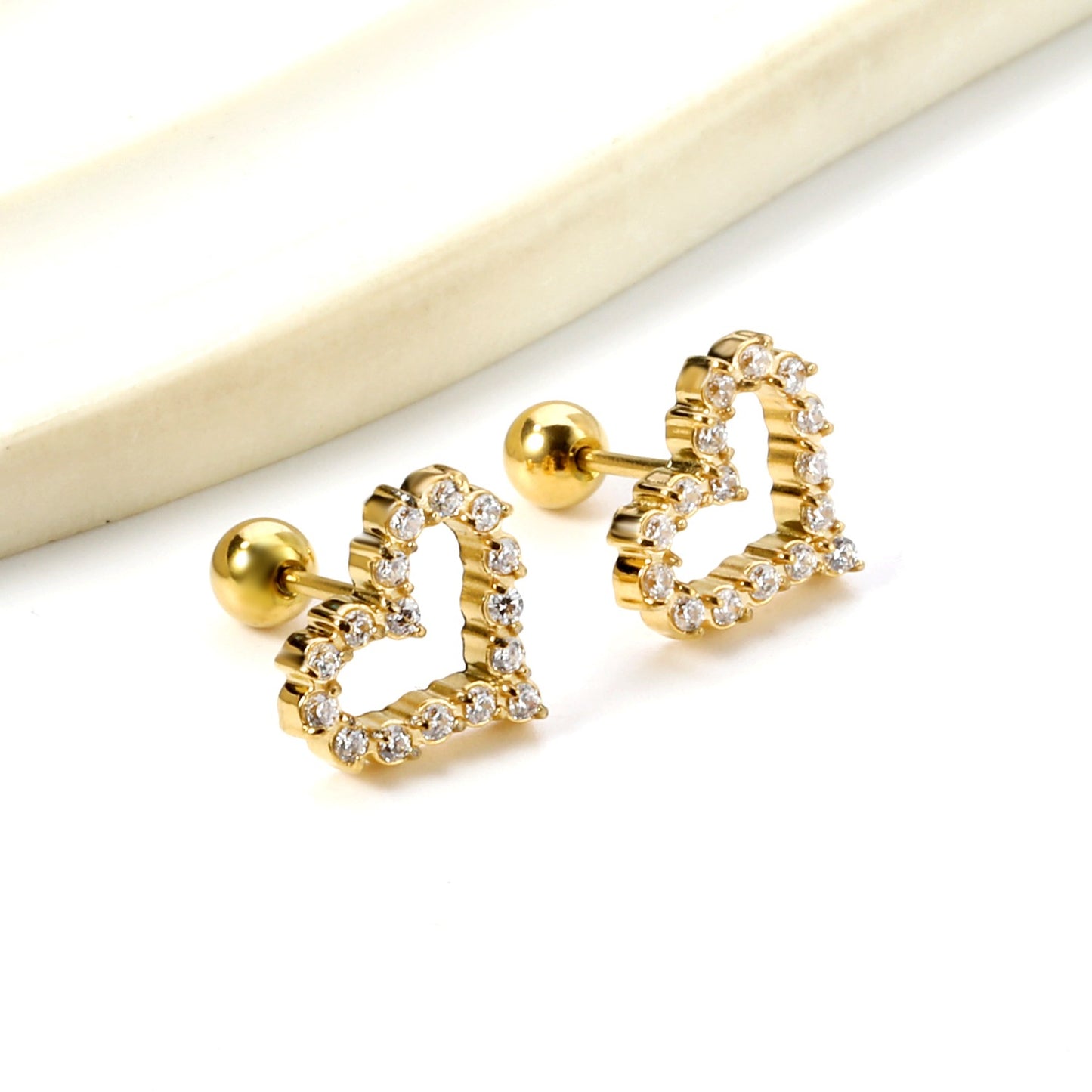 Heart shaped  screw studs with zircon stones.