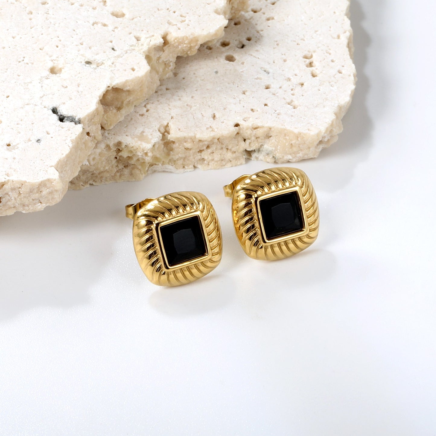 Square studs with a mini black square in the middle